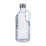 Diferentes botellas de cristal en usos creativos: kombucha, leche vegetal, sirope, aceite infusionado